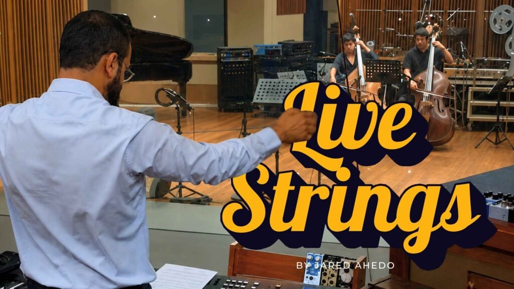 Grammy-credited string arranger Jared Ahedo conducting a live string recording session.